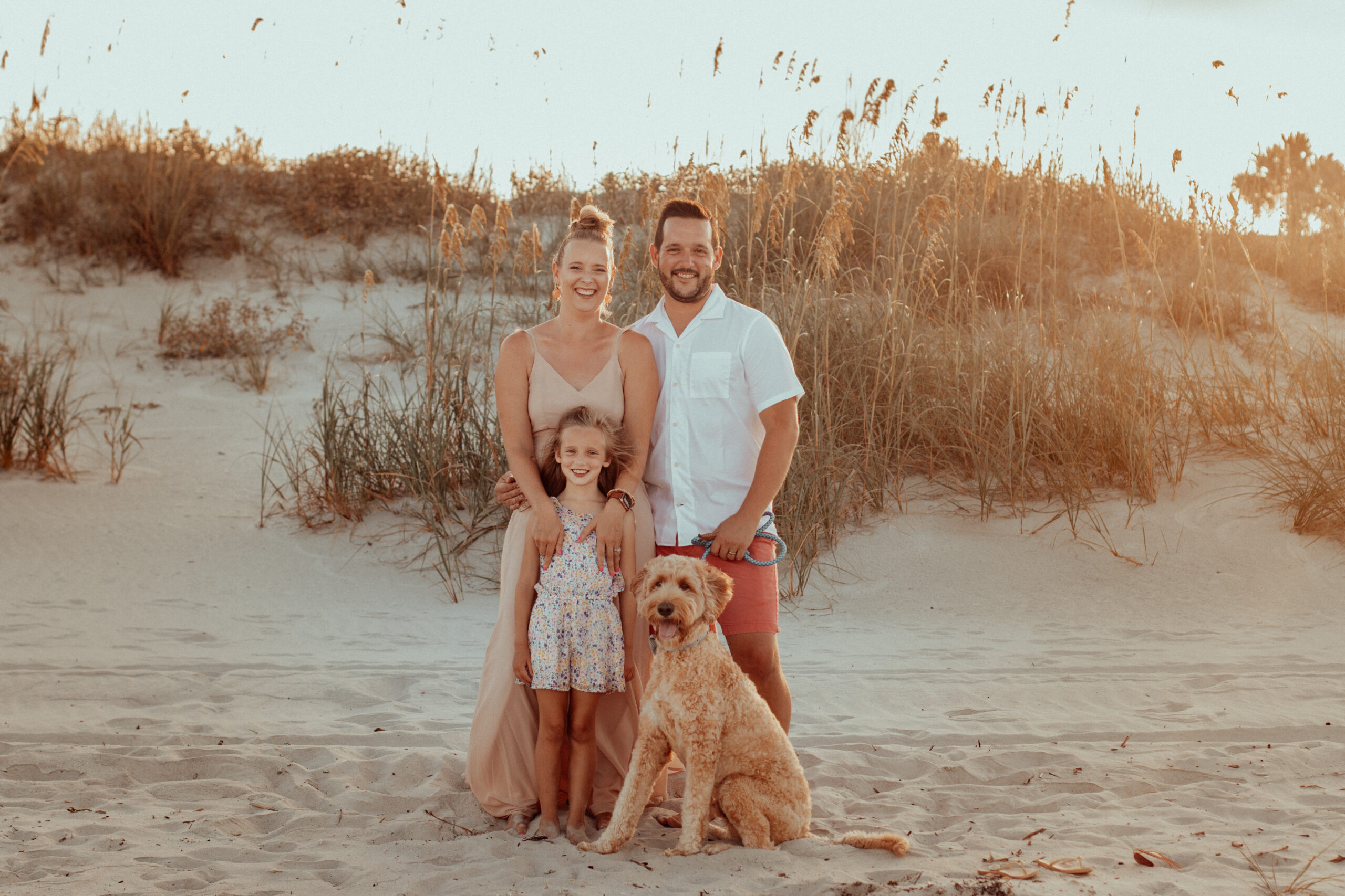 Heirlooms and Lace Studios on the beach with her family in Jacksonville.