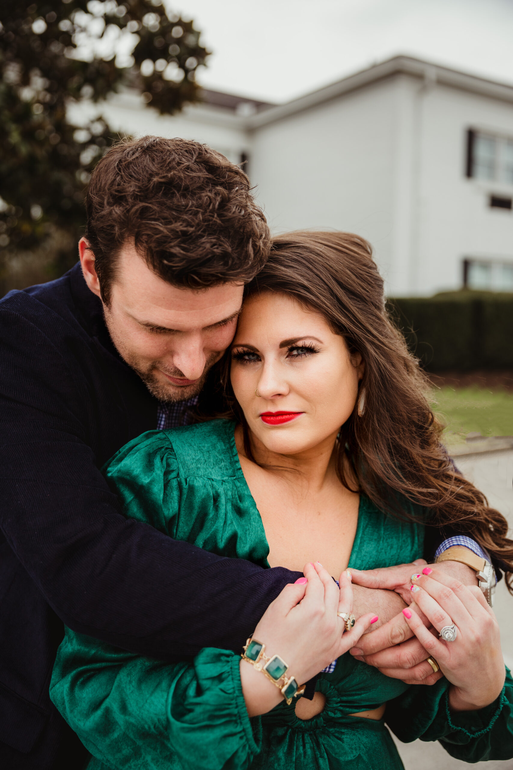 Jeremy and Brittany snuggled up outside The Campbell House Lexington, Curio Collection by Hilton